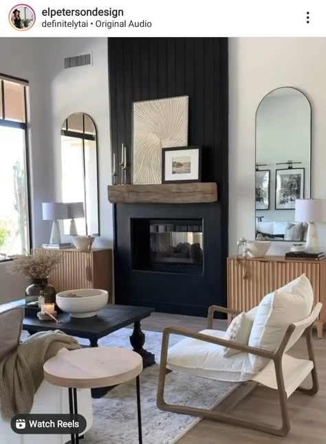 Mid Century Modern Black Fireplace, Living Room With Tan Tile Floor, Small Living Room Ideas With Fireplace Furniture Arrangement, Modern Fireplace With Sconces, Mirror On Either Side Of Fireplace, Living Room Designs With Black Fireplace, Moody Modern Home Aesthetic, Small House Built Ins, Grey Painted Rock Fireplace