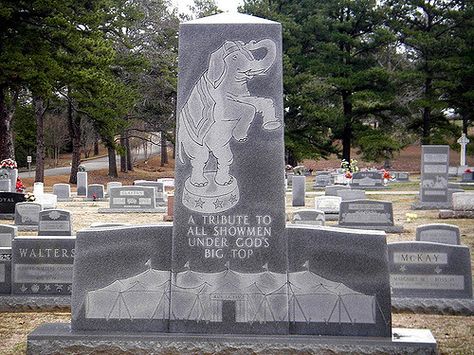 You can miss the Showmen’s Rest as it is marked by elephant topped monuments, with tributes to “all showmen under God’s big top,” from animal trainers to jugglers to high wire artists. Description from cakeheadlovesevil.wordpress.com. I searched for this on bing.com/images Hugo Oklahoma, Lane Frost, Wild Bull, Cemetery Headstones, Circus Performers, Travel Oklahoma, Old Cemeteries, Circus Animals, Cemetery Art