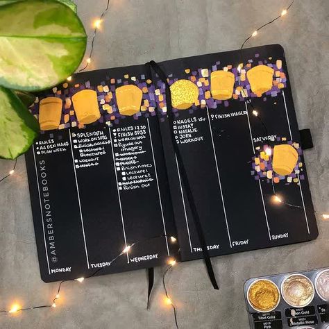 A Disney-inspired bullet journal weekly spread featuring Tangled floating lanterns that are easy to recreate! Made by @AmbersNotebooks #octobercoverpage #octobermonthly #octoberbujo #octoberbulletjournal #bujocoverpage #blackbujo #blackbujospread #archerandolive #archerandoliveblackout #planwithme #blackoutjournal #monthlyspread #bujoideas #bujoinspo #bujomonthly #bujoweekly #bujoinspiration #bujobeauties #bujoart #disneybujo #disneybulletjournal #disneytangledtheme #tangledbujo Tangled Floating Lanterns, Weekly Bullet Journal, Tangled Lanterns, Journal Weekly Spread, Bullet Journal 2020, Bullet Journal Setup, Bullet Journal Weekly, Floating Lanterns, Bullet Journal Weekly Spread