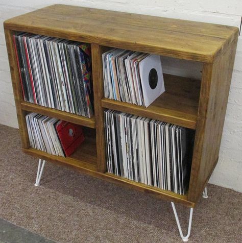 Stunning reclaimed wood vinyl storage unit, from weathered scaffold boards on white hairpin legs. Has two compartments for 12 inch records and two compartments for 7 inch records. Dimensions (approx) Length: 90cm Height: 88cm Depth: 38cm Compartment dimensions: 12 inch records = Scaffold Furniture, Store Vinyl Records, Bedroom Revamp, Vinyl Display, Scaffold Boards, Book Cabinet, House Extension Design, House Extension, Vinyl Record Storage