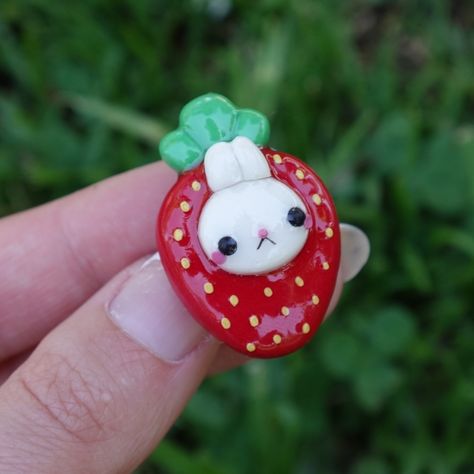 Another look at the strawberry bunny pins! They are so cute! 🍓 🐰 - - - - - #bunny #clay #strawberry #polymerclay #smallartist #smallbusiness #shopify #charms #pins #art #artist #magpiejay Bunny Clay, Clay Strawberry, Strawberry Bunny, Clay Inspo, Clay Magnets, Clay Things, Polymer Clay Animals, Clay Animals, Cute Strawberry