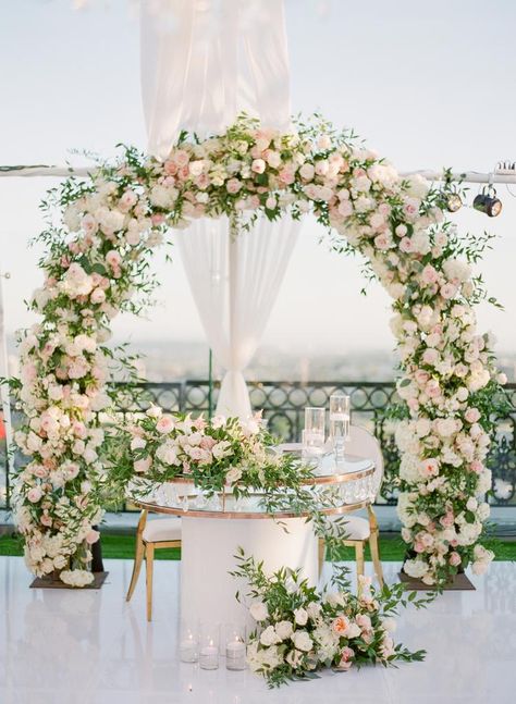 A Romantic Garden Wedding Above The Clouds, Between The Beverly Hills Rooftops Wedding Cake Table Set Up Display, Church Wedding Arch Ideas, Bridge Flowers Wedding, Garden Wedding Arch, Floral Cloud Wedding, Hanging Flower Clouds Wedding, Wedding Flower Canopy Above Table, Flower Arch Wedding, Floral Bridge Centerpiece Wedding