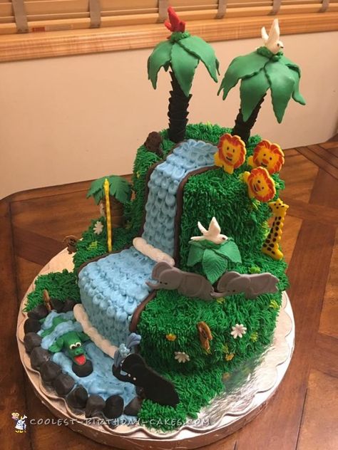 Final view of the cake at the venue! Safari Cake Ideas, Jungle Book Cake, Jungle Themed Cake, Waterfall Cake, Jungle Theme Cake, Jungle Birthday Cakes, Wild Kratts Birthday Party, Fondant Leaves, Jungle Cakes