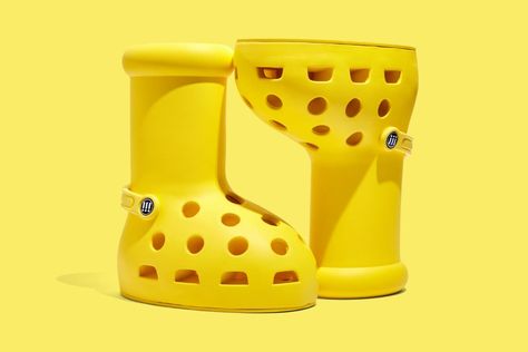 MSCHF’s Giant Yellow Crocs-Boots Will Set You Back An Equally Tall Wad Of Cash - DesignTAXI.com Big Red Boots, Wad Of Cash, Yellow Crocs, Colored Boots, Crocs Boots, Yellow Boots, Uma Thurman, Astro Boy, Chunky Shoes