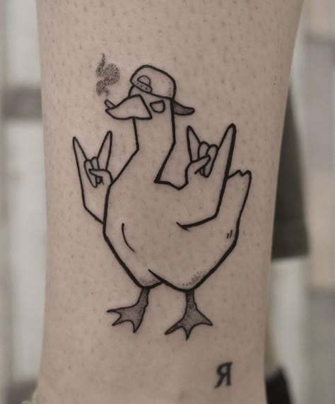 Funny Thigh Tattoos For Men, Duck Tattoos Small Funny, Cool Duck Tattoo, Duck Duck Goose Tattoo, Silly Goose Tattoo Matching, Funny Fine Line Tattoos, Cartoon Duck Tattoo, Funny Duck Tattoo, Goose Tattoo Simple