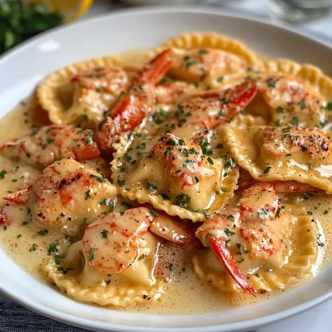 Lobster Ravioli in Garlic Butter Sauce: A Gourmet Delight at Home Christmas Ravioli Dinner, Lobster Ravioli Recipe Homemade, Lobster Ravioli With Cream Sauce, Red Lobster Crab Alfredo, Homemade Seafood Ravioli, Lobster Tortellini Sauce, Lobster Ravioli Soup, Crab And Lobster Ravioli, Ravioli Sauce Creamy