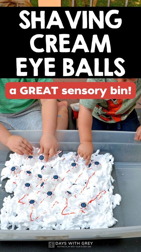 two children playing in a plastic sensory bin. The bin has shaving cream, orange food coloring, and plastic eye balls to mix around Shaving Cream Halloween Activities, Halloween Shaving Cream Activity, Halloween Messy Play Toddlers, Halloween Messy Play, Hand Strengthening Activities, Halloween Toddler Party, Halloween Lesson Plans, Halloween Stem Activities, Halloween Stem