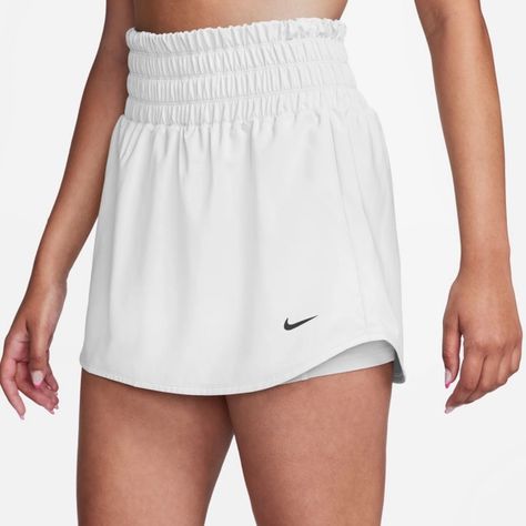 Nike One Ultra High-Waisted Skort With Lightweight, Breathable Fabric With A Single Pleat In The Front, Which Gives You Room To Move. Dri-Fit Technology. Sewn-In Inner Shorts With A Pocket Large Enough To Store A Phone, Tennis Balls, Etc. White. New With Tags! Blue Tennis Skirt, Nike Skort, Nike Skirt, Nike Skirts, Tennis Skort, Golf Skirts, Tennis Balls, Nike White, Suit Shop