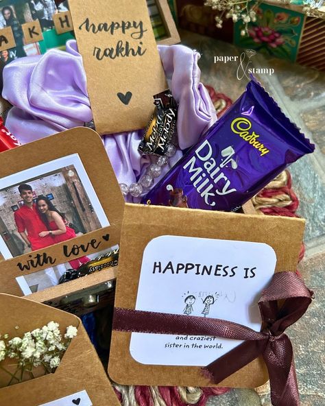 Celebrate the spirit of togetherness with our exquisite vintage rakhi gift box, a timeless keepsake designed to cherish special connections 💌 Our Rakhi Gift Box contains- 1. A collage frame 2. Two Film strips 3. Mini Flower Envelope 4. Rakhi (For Brother)/Scrunchie-Bracelet Set (For Sister) 5. Polaroids 6. Chocolates and other goodies 7. Small message card (40-50 words) The lid of the box will also be adorned with pictures, flowers and collages 🌻 Follow @paperandstamp for more✨ DM TO BUY ... Scrunchie Bracelet, Flower Envelope, Pictures Flowers, Rakhi Gift, Crazy Sister, Rakhi For Brother, Collage Frame, 50 Words, Film Strip