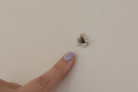 Drywall holes can be overwhelming. We are sharing our simple steps to a fixing small drywall holes on the blog. Learn how to get rid of unsightly holes in drywall from anchors, nails, and screws, prep for paint or wallpaper and improve the look by patching drywall holes. This is going to help homeowners and renters quickly get hole free drywall. Head to the blog to learn more. | drywall holes | patch small drywall holes | nail holes #diy #drywall #paintprep Fix Nail Holes In Wall, How To Fix Nail Holes In Walls, Wall Patching Drywall, Filling Nail Holes In Wall, Patching Nail Holes In Walls, How To Patch Nail Holes In Walls, How To Fill In Nail Holes In Walls, Patch Nail Holes In Wall, How To Fix A Hole In Drywall