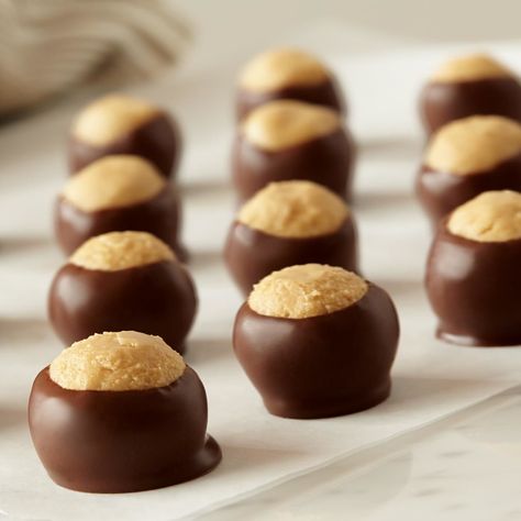 Learn how to make buckeye cookies with this recipe. All you need is Jif® Creamy Peanut Butter, chocolate chips, and butter to make this tasty treat. Buckeye Cookies, Peanut Butter Buckeyes, Buckeyes Recipe, Jif Peanut Butter, Peanut Butter Balls, Peanut Butter Recipes, Butter Recipe, Cookie Desserts, Candy Recipes