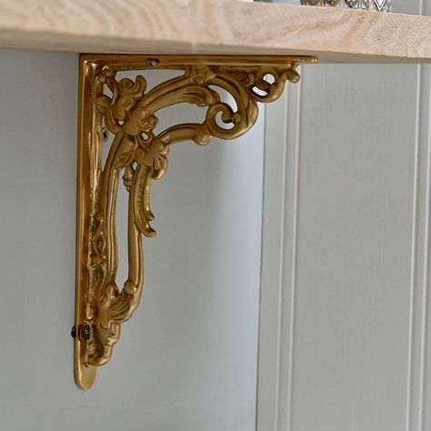 Choosing the right size shelf bracket | Yester Home Modern Victorian Library Room, Gold Accent Home Decor, Brass Interior Design, Gold Shelf Brackets, Victorian Shelves, Victorian Details, Brass Shelf Brackets, Gold Toilet, Brass Shelf