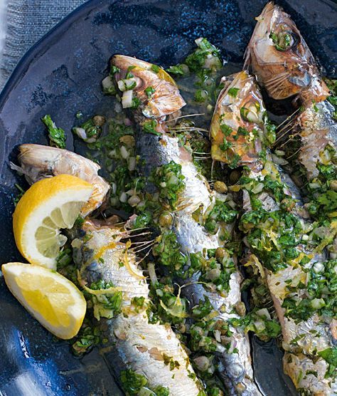 These grilled sardines taste delicious when paired with a fresh salsa verde. | Tesco Herring Recipes, Grilled Sardines, Southwestern Recipes, Sardine Recipes, Salsa Verde Recipe, Food Fest, Tesco Real Food, Easy Seafood, Fresh Salsa