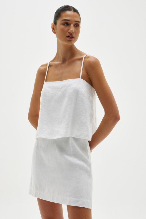 Our Neva Linen Cami will be on high rotation in your wardrobe all season. Designed with a straight neckline and slim adjustable straps, this linen camisole has a relaxed silhouette that floats around the body. Style this slip-on top with your favourite denim, or pair with linen skirts and pants for a head-to-toe linen look. Chic Linen Tank Top With Spaghetti Straps, Linen Spaghetti Strap Top, Linen Cami Top, Linen Camisole With Adjustable Straps, White Linen Cami Top, Linen Cami, Linen Skirts, Linen Camisole, Assembly Label