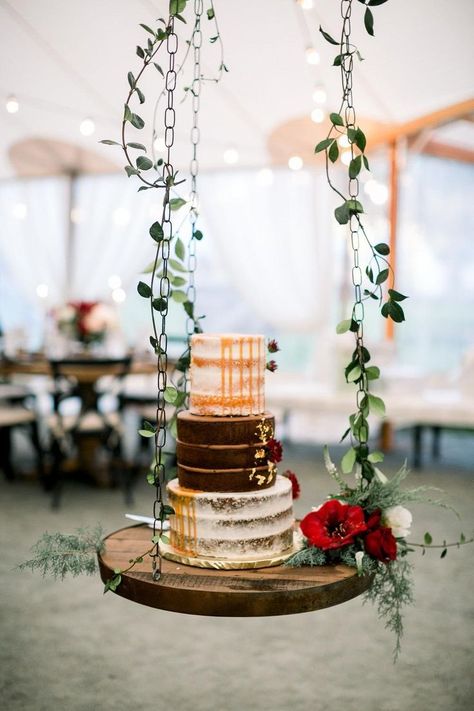 Tis the season for a glamorous holiday wedding and this gorgeous winter wedding is one for the books! With a massive sailcloth tent, a hanging cake display made by the bride and groom and the perfect blend of red and green with gold and black details makes for the #dream holiday wedding. #weddingcake #weddingcakedesign #modernweddingcake Sailcloth Tent Wedding, Rosette Cake Wedding, Hanging Cake, Geometric Wedding Cakes, Wedding Cake Art, Metallic Wedding Cakes, Christmas Wedding Cakes, Tent Wedding Reception, Monogram Wedding Cake