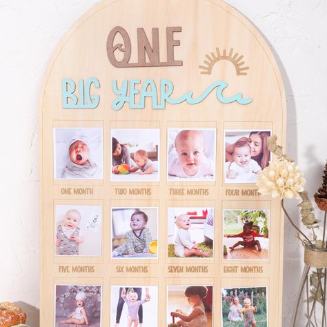 PRICES MAY VARY. MEMORABLE MILESTONES DISPLAY - Capture the journey of your little surfer's first year with The Big One Surf One Year Old Photo Board! This beautifully crafted wood board provides the perfect backdrop to showcase your baby's monthly milestones, creating a cherished keepsake for years to come. WAVE-THEMED DESIGN - Ride the wave of excitement with this surf-themed photo board! Featuring vibrant colors and playful wave designs, it adds a fun and whimsical touch to your little one's Surf 1st Birthday Party Boy, Surfer First Birthday, 12 Months Photo Frame, First Year Photo Display, The Big One Birthday Party, The Big One Surf Birthday, The Big One First Birthday, 1st Birthday Decoration, Surf Birthday Party