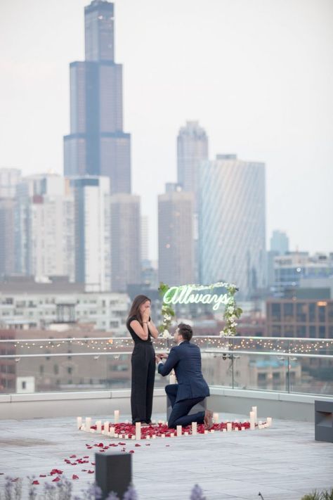 He proposed on a Chicago rooftop with the Chicago skyline in the back! Read more on How They Asked! #howtheyasked #chicago #chicagoskyline #chicagoproposal #engagement #engaged #engagementideas #cityengagement #howtopropose #weddinginspo #proposalinspo #dreamproposal #summer Proposal Ideas Chicago, Proposal Ideas City, Chicago Proposal Ideas, Candlelit Proposal, Proposal Tips, Chicago Photoshoot, Rooftop Proposal, Chicago Rooftop, Chicago Proposal