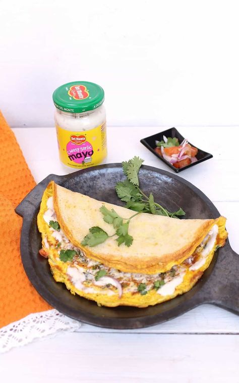 Egg dosa with mayonnaise is one of the dosa varieties that can be made easily for breakfast. Dosa is a savory crepe made with rice and lentil batter. I have added eggless cheesy garlic mayo as a topping on egg dosa recipe which has egg batter spread on it. This egg dosa is an innovative twist to the regular dosa. Addition of mayo makes it delicious. Egg Dosa, Savory Crepe, Dosa Recipes, College Snacks, Dosa Batter, Mayo Recipe, Prepared Eggs, Garlic Mayo, Garlic Dip