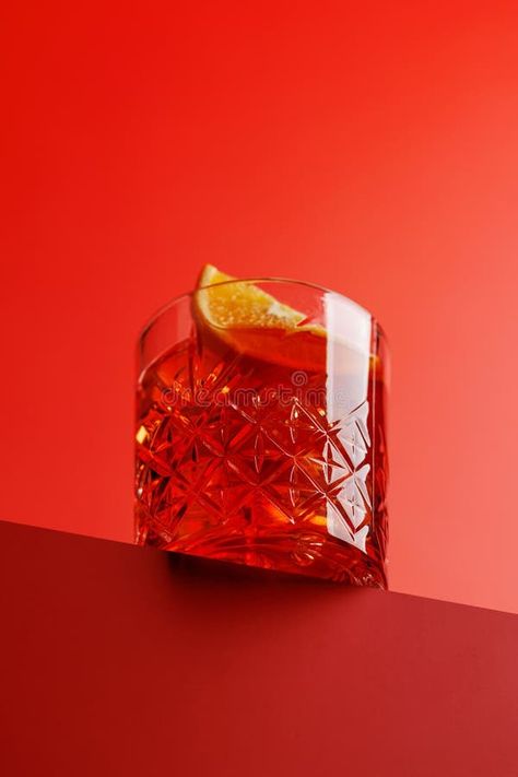 Cocktail delight: Classic negroni against a red background stock photos Harsh Light Food Photography, Liquor Bottle Photography, Negroni Photography, Negroni Aesthetic, Negroni Drink, Hennessy Aesthetic, Cocktail Shoot, Grenadine Cocktail, Classic Negroni