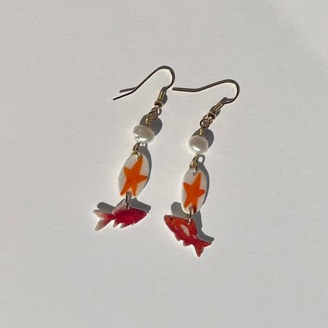 🎏 Go Fish! ——— Handcrafted by Rachel! ~SOLD! DM if want something similar~ #jewelry #handmadejewelry #earrings #charms #craft Clay Fish Earrings, Art Stall, Clay Fish, Jewellery Dish, Jewelry Piercing, Fish Earrings, Earrings Charms, Funky Earrings, Body Jewelry Piercing