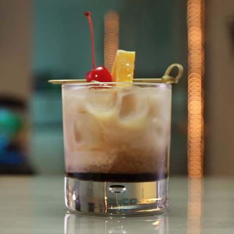 THE PARALYZER  1/2 oz. (15ml) Tequila 1/2 oz. (15ml) Vodka 1/2 oz. (15ml) Coffee Liqueur 1 oz. (30ml) Milk 1 oz. (30ml) Cola Orange Wedge Cherry  PREPARATION 1. Add ice to glass and pour vodka, tequila, coffee liqueur, milk and cola. 2. Garnish with orange wedge and cherry DRINK RESPONSIBLY! Paralyzer Drink, Paralyzer Drink Recipe, Paralyzer, Cherry Whiskey, Kahlua Drinks, Cherry Drink, Cola Drinks, Tipsy Bartender, Mixed Drinks Alcohol