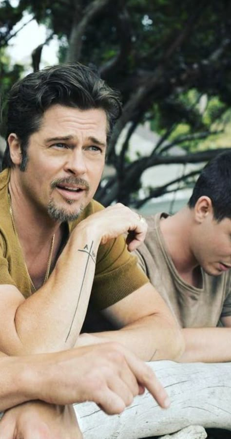 Brad Pitt Beard, Celebrity Tattoos Male, Brad Pitt Tattoo, Brad Pitt Pictures, Bar Counter Design, Forearm Band Tattoos, Gents Hair Style, Hair Catalog, Band Tattoo