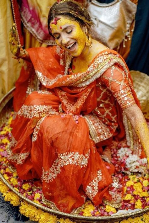 haldi outfit for brides Ankita Lokhande Haldi Ceremony, Orange Saree For Haldi, Latest Haldi Outfits For Bride, Haldi Suit Design For Bride, Yellow Sharara For Haldi For Bride, Colorful Haldi Outfit For Bride, Orange Outfits For Haldi, Haldi Saree Indian Bridal Yellow, Celebrity Haldi Look