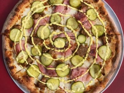 Cuban Pizza Recipe | Food Network Cubano Pizza, Cuban Pizza, Carving Turkey, Sports Party Food, Warm Appetizers, Pasta Restaurant, Cuban Pork, Scrabble Word, Pizza Cheese