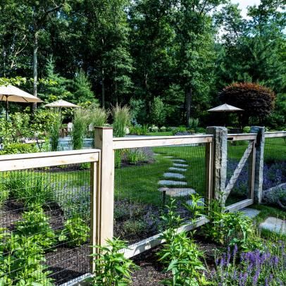 French Country Pictures | HGTV Photos French Country Fence, French Country Fence Ideas, Pretty Landscaping, Country Pictures, Kidney Shaped Pool, Country Fences, Arch Trellis, Front Fence, Garden Border