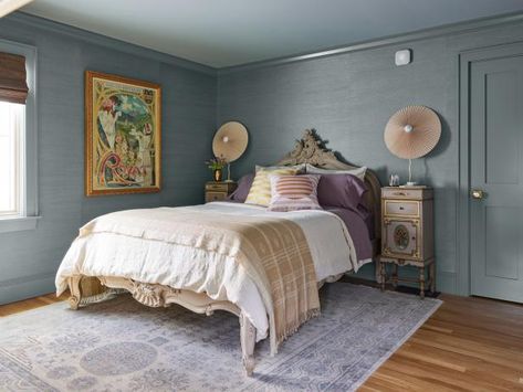 This chic bedroom strikes the right balance between traditional and eclectic. Homeowner Candace Karu found the ornate nightstands at a local antiques store, and the vintage-style squiggle lamps come from Etsy. The bed is new (from Anthropologie), but intricate carvings in the wood make it extra special. Fun Paint Ideas, Simple Boys Room, Cool Seating, Cool Headboards, Vibrant Bedding, Bedroom Decorating Tips, Hgtv Magazine, Best Bedroom, Bold Wallpaper