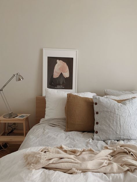 A view of our bedroom with linen bedding from HM Home and the poster from HAY Design. Beige wall with natural colors and materials, gives such a calm feeling.  #linenbedding #haydesign #hmhome #bedroomdecor #scandinavianstyle #beige Hm Home Bedroom, Airbnb Room, Hm Home, Hay Design, Beige Wall, Serene Bedroom, H&m Home, Beige Walls, Natural Colors