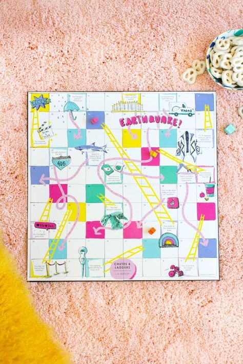 DIY Los Angeles Chutes and Ladders Game | lovelyindeed.com Chutes And Ladders Game, Reban Ayam, Chutes And Ladders, Ladders Game, Board Games Diy, Diy Ladder, Board Game Design, Snow Fun, Diy Cans