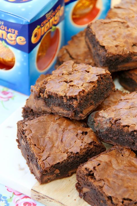 Moist, Chocolatey and Delicious Brownies with a hint of Orange, dotted with Terry’s Chocolate Orange Chunks! It’s not secret that I adore Chocolate Orange – I already have oodles of other Chocolate orange recipes on my blog, so I think that says it all really… One of my first recipes to get seriously popular was my Chocolate Orange Cookies, which are amazing by the way, like I have no joke made them over 50 times. My favourite Terry’s Chocolate Orange recipe however is my No-Bake Chocolate Or... Chocolate Orange Recipes, Chocolate Orange Brownies, Orange Recipe, Chocolate Orange Cookies, Orange Brownies, Cocoa Brownies, Terry's Chocolate Orange, Baking Stuff, Quick Cake