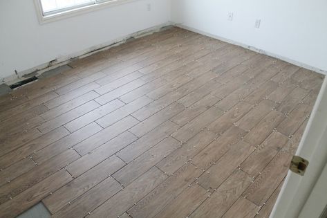 Tips for Achieving Realistic Faux Wood Tile - Chris Loves Julia Wood Tile Pattern, Fake Wood Flooring, Wood Like Tile, Plank Tile Flooring, Faux Wood Tiles, Wood Look Tile Floor, Faux Wood Flooring, Wood Tile Bathroom, Wood Plank Tile