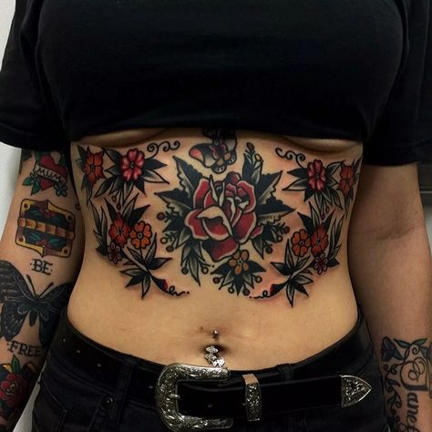 Traditional Floral Sternum Tattoo | Tattoo Ideas and Inspiration Traditional Rib Tattoo, Hayley Tattoo, Girl Stomach Tattoos, Skin Pictures, Lower Stomach Tattoos, Heavily Tattooed, Stomach Tattoos Women, Neotraditional Tattoo, Traditional Tattoo Sleeve