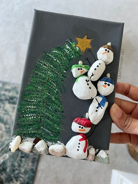 Paint a DIY Christmas Tree and Snowman Rock Art - Craftionary Pebble Art Ideas, River Rock Crafts, Decoration For Wall, Rock Projects, Christmas Pebble Art, Projects For Home, Christmas Tree Printable, Stone Pictures Pebble Art, Pebble Art Family