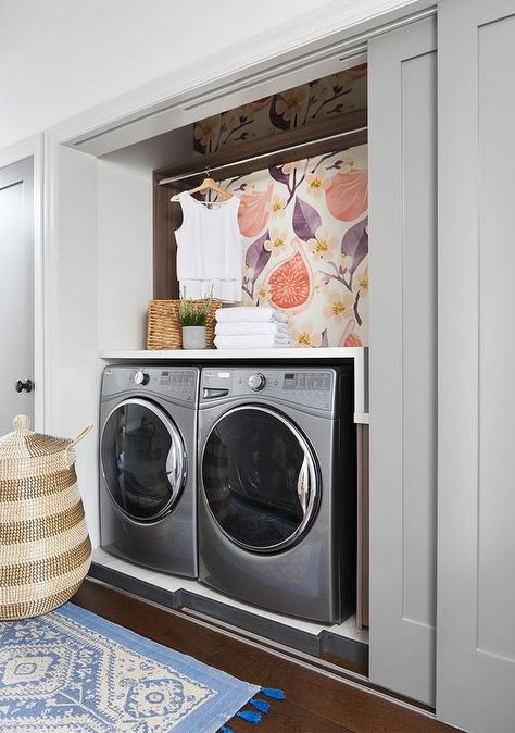 Washer and dryer in wallpaper clad hall closet In Closet Washer And Dryer, Washer And Dryer In Hall Closet, Hallway Laundry Closet, Hall Laundry Closet Barn Door, Fig Wallpaper, Washer And Dryer In Bathrromlg Laundry Tower, Utility Bathroom, Laundry Roon Wallpaper, Wallpaper Laundry