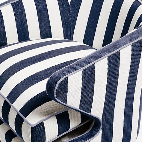 Put your show-stopping style up in lights. The Marquee Navy Stripe Chenille Accent Chair is a versatile striped silhouette that mixes and matches with solids and patterns. It has a domestic hardwood frame wrapped with upholstery-weight chenille and is accented with contrasting periwinkle cording. Our exclusive fabric decking is underneath the loose seat cushion. White Upholstered Chair, Striped Chair, Blue Chair, Chair Upholstery, Mackenzie Childs, Navy Stripes, Accent Chair, Upholstered Chairs, Seat Cushion