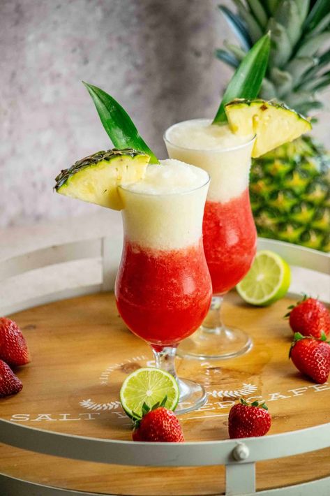 This easy Miami Vice recipe is an easy frozen drink, which combines 2 delicious cocktails (Strawberry Daiquiri and Pina Colada) into the perfect summer cocktail! Lava Flow Drink Recipe, Lava Flow Drink, Pinterest Drink, Tropical Drink Recipes, Breakfast Cocktails, Malibu Rum, Colorful Cocktails, Vegetarian Side Dishes, Light Rum