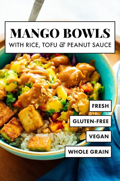 Meet your new favorite summer dinner, these refreshing and hearty mango tofu bowls! They're made with brown rice, fresh mango salsa, tofu and peanut sauce. Think of them as an Asian spin on your favorite burrito bowl. #mango #tofu #vegan #vegetarian #dinnerrecipe #cookieandkate Mango Tofu, Tofu Bowls, Fresh Mango Salsa, Tofu Vegan, Burrito Bowls, Crispy Tofu, Vegan Bowls, Burrito Bowl, Mango Salsa