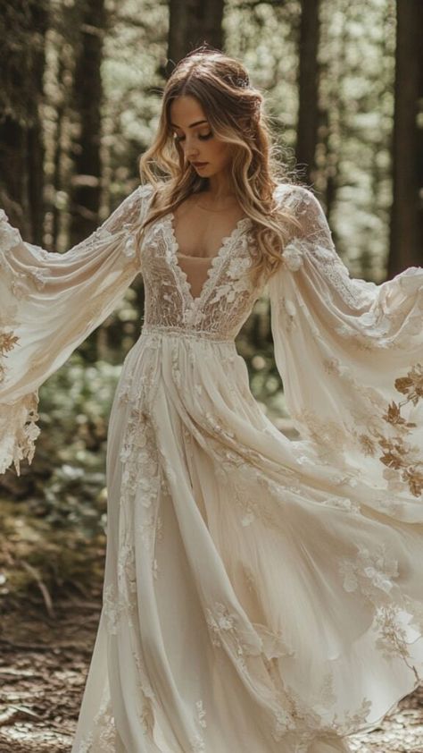 Looking for the perfect dress for a forest wedding? Discover enchanting styles that blend elegance with natural beauty. From bohemian lace to whimsical embroidery, these ideas will inspire your woodland celebration. Whether you want minimal chic or fairy-tale glamour, find your dream look here. Get ready to shine on your special day surrounded by nature. Don’t miss these breathtaking ideas—start planning now! Cottagecore Aesthetic Wedding Dress, Boho Wedding Dress With Sleeves Bohemian, Fairy Wedding Dress Woodland, Boho Fairy Wedding Dress, Woodland Fairy Wedding Dress, Whimsical Wedding Dress Fairies, Hippy Wedding Dress, Forest Fairy Wedding Dress, Enchanted Gown