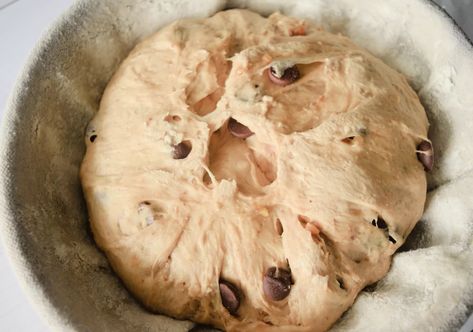 Sourdough in a banneton for dough on a white parchment paper for Peanut Butter with Chocolate Sourdough Bread Recipe.. Double Chocolate Chip Sourdough Bread, Chocolate Peanut Butter Sourdough Bread, Unique Sourdough Flavors, Winter Sourdough Recipes, Peanut Butter Sourdough Bread, Sourdough Bread Recipes With Inclusions, Holiday Sourdough Bread, Dessert Sourdough Bread, Smores Sourdough Bread