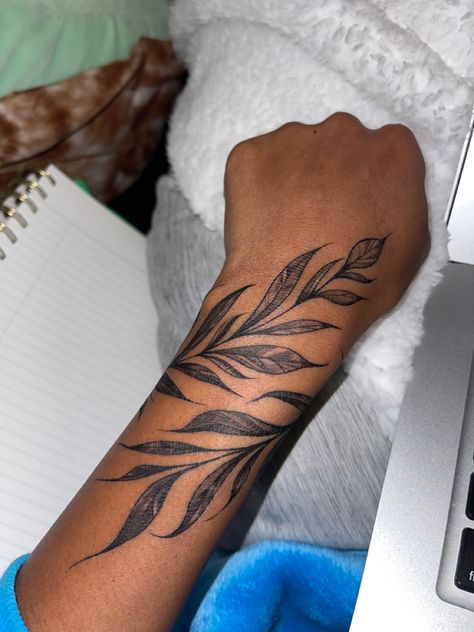 Leaves Wrist Wrap Tattoo, Wrap Around Half Sleeve Tattoo, Wrap Around Tattoo Ideas Female, Plant Tattoo Black Women, Wrap Around Tattoo Black Women, Henna Wrap Around Tattoo, Leaves Sleeve Tattoos For Women, Leaf Around Wrist Tattoo, Leaf Ankle Tattoo Wrap