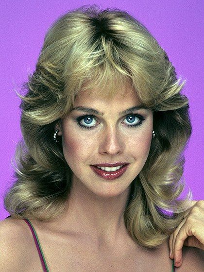 Parted down the middle with your bangs and short side layers curled back and frozen in place with hair spray, Farrah Fawcett made this look iconic. Then Jenilee Harrison of Three's Company adopted it, and everyone from your best friend to your third-grade English teacher was wearing it. 1980 Hairstyles, 80s Short Hair, 80 S Hairstyles, 80s Hair Styles, 80’s Hair, 80's Hairstyle, 1980s Hair, Pompadour Fade, Prom Hair Updo