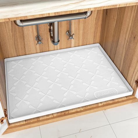 PRICES MAY VARY. 【Applicable Size】SIKADEER food-grade silicone mat measures 31x19 inches, ideal for standard 33-inch cabinets. It's designed with raised edges to contain significant amounts of water and prevent leaks, meets a variety of protection and storage needs in your house. 【Dry and Healthy Space】The sink tray covers a wide area beneath the sink, protecting your cabinets from damage caused by leaks, spills, stains, and scratches. Preserve your cabinet's appearance and ensure a hygienic env Bathroom Cabinet Shelf, Expensive Bathrooms, Under Sink Mat, Under Sink Organizer, Sink Tray, Boot Tray, Laundry Room Sink, Standard Kitchen, Sink Mats