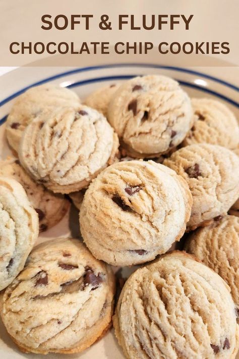 Chocolate chip cookies on a plate. Thick Fluffy Cookies, Chocolate Chip Cookies Recipe Fluffy, How To Make Cookies Fluffier, Soft Thick Chocolate Chip Cookies, Puffy Chocolate Chip Cookies Soft, Big Fluffy Chocolate Chip Cookies, Fluffy Chocolate Chip Cookies Recipe, Thick Cookies How To Make, Fluffy Cookie Recipe