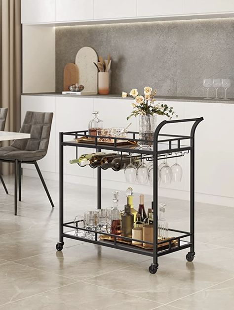 - Perfect for any home - [Large Size, Great Joy] Sized 15”D x 31.5”W x 30.5”H and with 20.3” between the shelves, this 2-tier bar cart offers spacious room for your bar essentials. Whisky, gin, and rum...put all your favorite drinks on - [Make a Statement] Featuring a stylish black frame, mirrored shelves, and an elegantly curved handle, this serving cart is a good chance to put your style on display while perking up your bar area, dining room, or kitchen Mirrored Shelves, Wine Holders, Wine Cart, Bar Serving Cart, Glass Bar Cart, Home Bar Design, Vintage Bar Carts, Kitchen Trolley, Bar Essentials