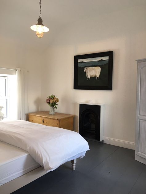 dark painted floor and stove inset Dark Painted Floors, Painted Floor Bedroom, Black Painted Floors, Traditional Irish Cottage Interiors, Dark Floor Bedroom, Dark Floorboards, Traditional Irish Cottage, Grey Painted Floor, Irish Cottage Interiors