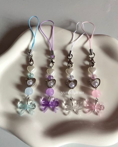 ⊹₊˚ ୨୧ ribbon phone charms ♡ ‧₊˚ ⋅ 🎀 Etsy coming soon! ˖ ˖ ˖ #ribbon #bow #heart #pearl #phonecharm #handmade #beads #keychain #handmadejewelry #charms Bow Keychain Beads, Diy Pearl Keychain, Beaded Keychain Diy, Bead Keychain Ideas, Cute Phone Charms, Ribbon Keychain, Freebie Ideas, Beads Keychain, Diy Jewelry To Sell