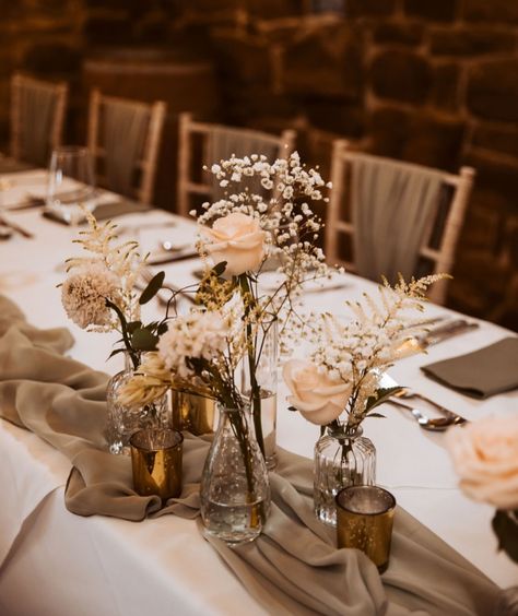 DOT & GROUP 💫 Delicate stems of florals in an eclectic mix of bud vases are such a versatile option. Group them in clusters for added floral volume or simply dot them around in a singular fashion for a more subtle touch of romance 🫶✨ @ambiencemalton @angelawaitesphotography . . . . #weddingday #weddingdaydetails #weddingideas #weddinginspo #weddingdecorideas #weddingstyle #eventstylist #weddingdesign #weddingdetails #weddingtabledecor #weddingreceptiondecor #weddingreceptionideas #centrep... Assorted Vases Wedding Centerpieces, Bud Vase Decor, Wedding Bud Vases, Weeding Themes, Wedding Table Vases, Bud Vases Wedding, Vases Wedding, Vintage Wedding Table, Brown Vase